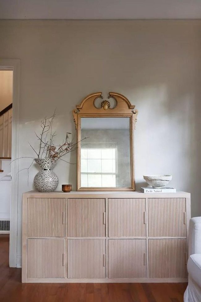 Gold Mirror, Cream, And Light Wood