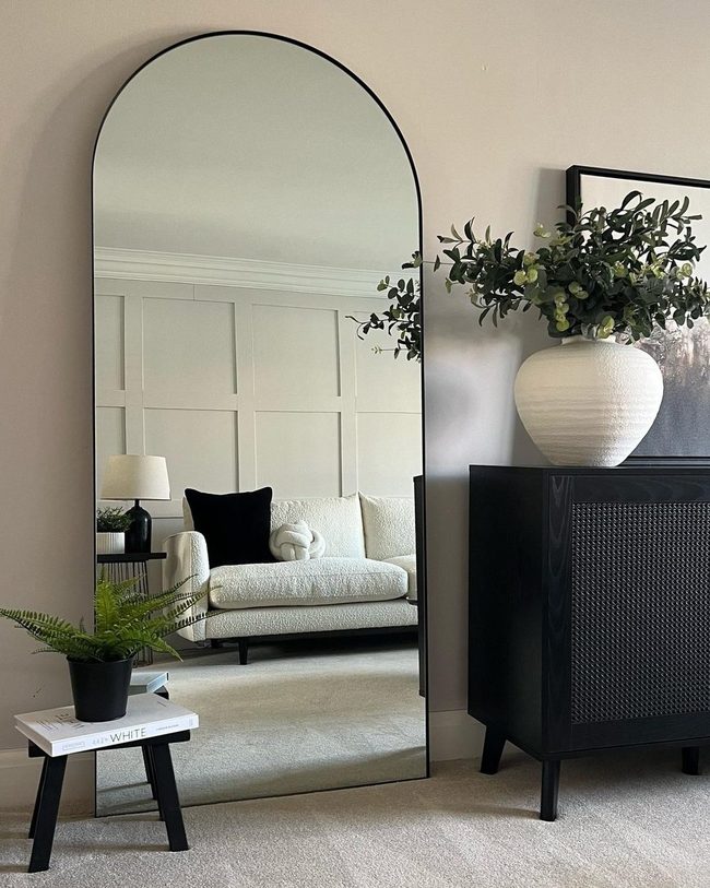 Black Arch Mirror Expands Modern Space