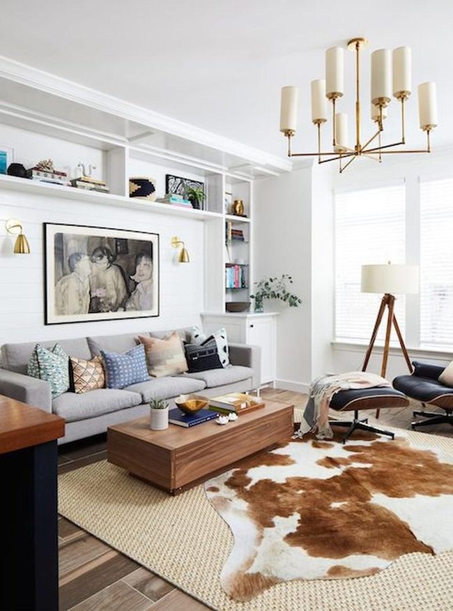 Wooden Table Anchors Layered Rugs