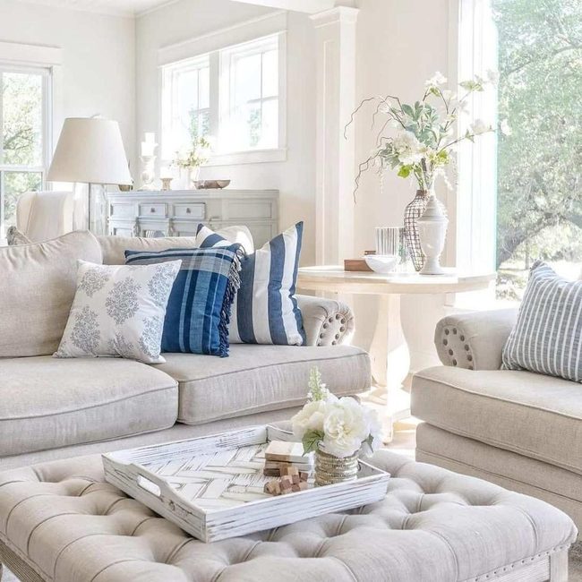 Blue Pillows Pop Against Beige