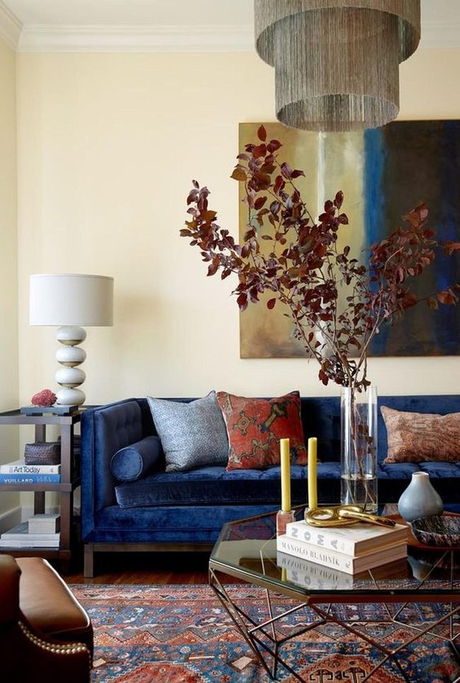 Blue Velvet Sofa Meets Gold Accents