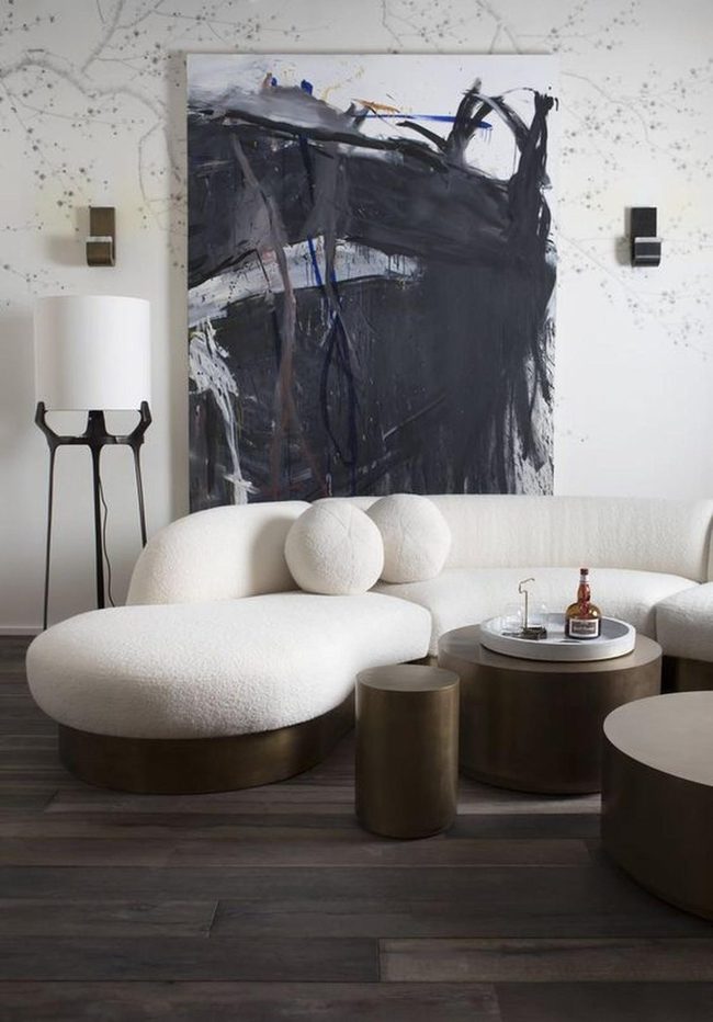 Dark Wood Floors With Curved White Sofas