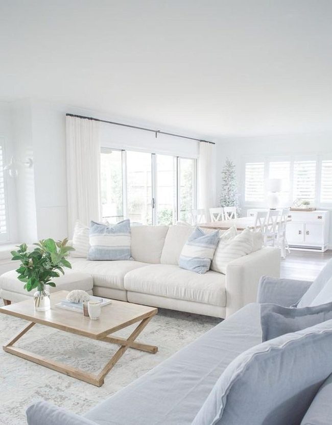 Light-Filled White Room With Blue Accents
