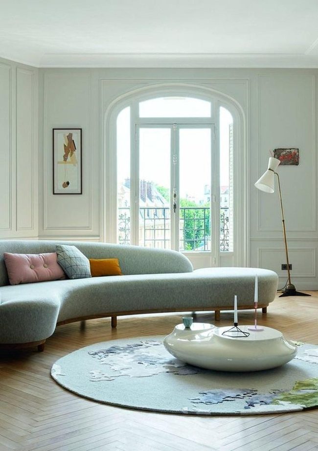 Curved Gray Sofa With Colorful Pillows
