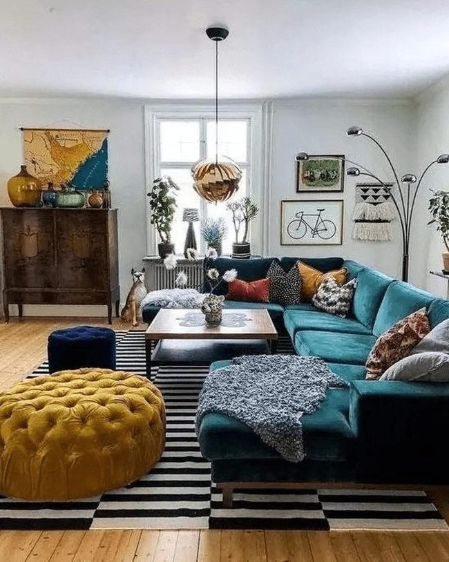 Teal Sofa With Rainbow Accent Pillows
