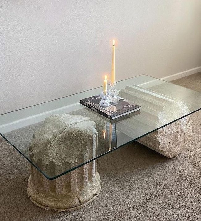 Glass Table Supported By Stone