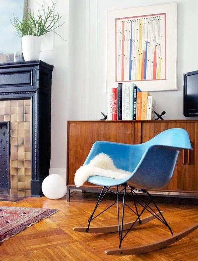 Blue Chairs Frame Inviting Fireplace Room
