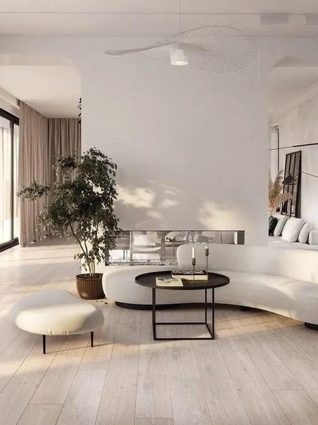 Curved White Sofas, Sculptural Ceiling Fans
