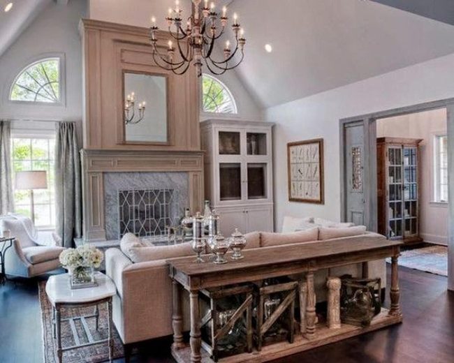 Wooden Chandelier Anchors Warm Living Space