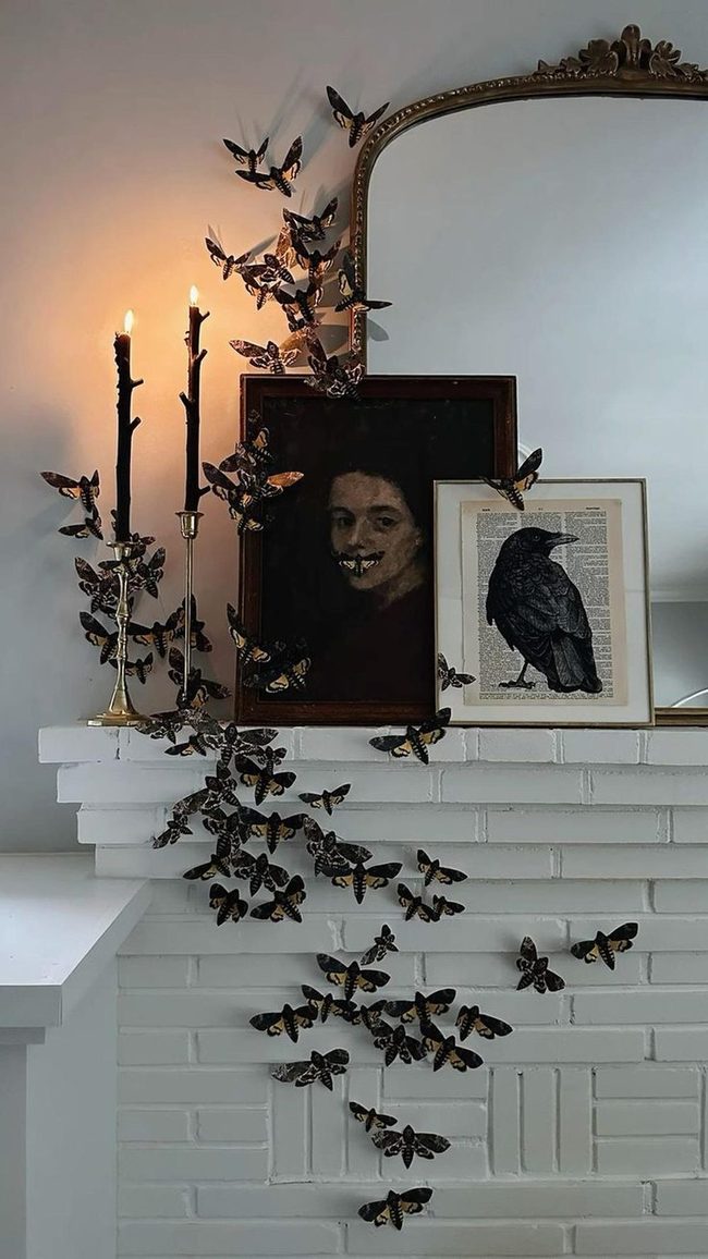 Dark Butterflies Against White Brick