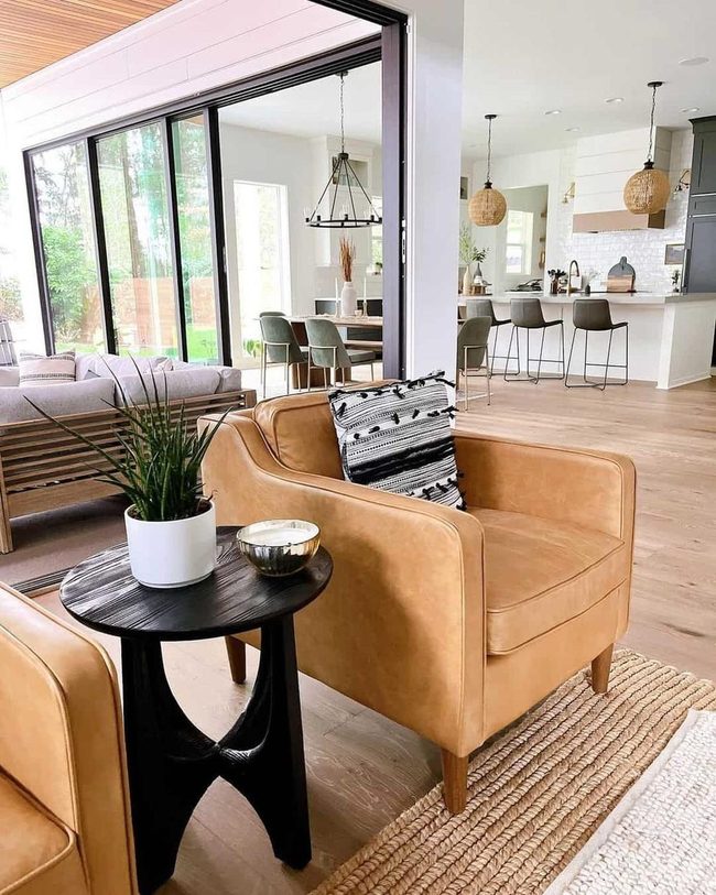 Black Round Table, Brown Leather Seating