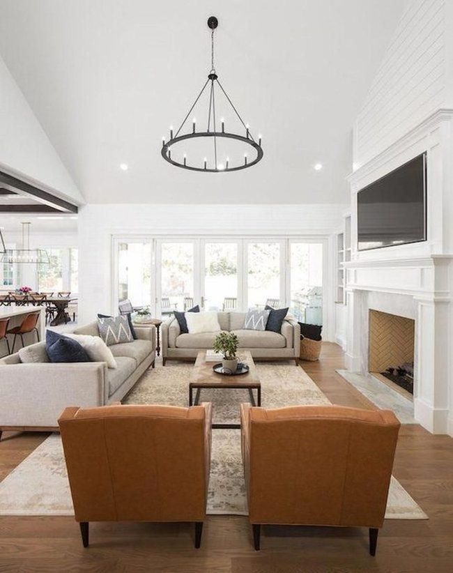 Black Chandelier, Leather Seating, Light Filled