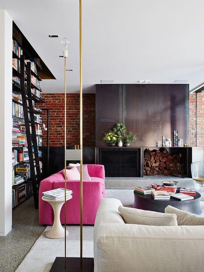 Brick Fireplace With Pink Sofas