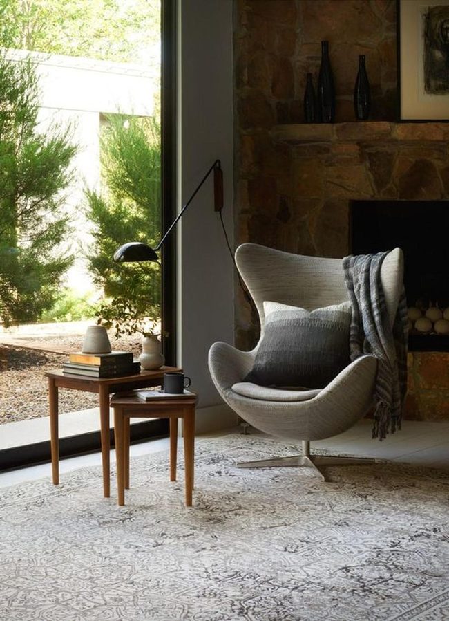 Stone Fireplace Anchors Layered Living Room