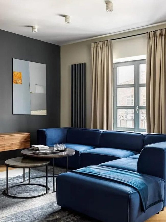 Dark Blue Sectional Anchors Modern Space