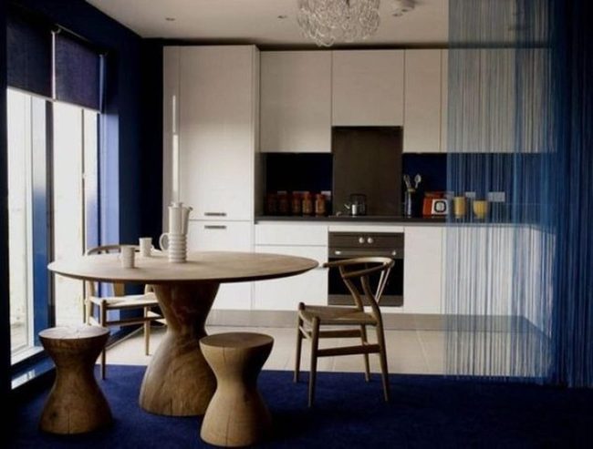 Deep Blue Kitchen With Wooden Accents