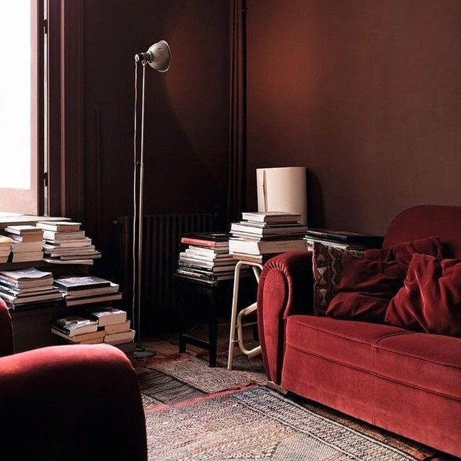 Red Reading Room With Pillowed Comfort