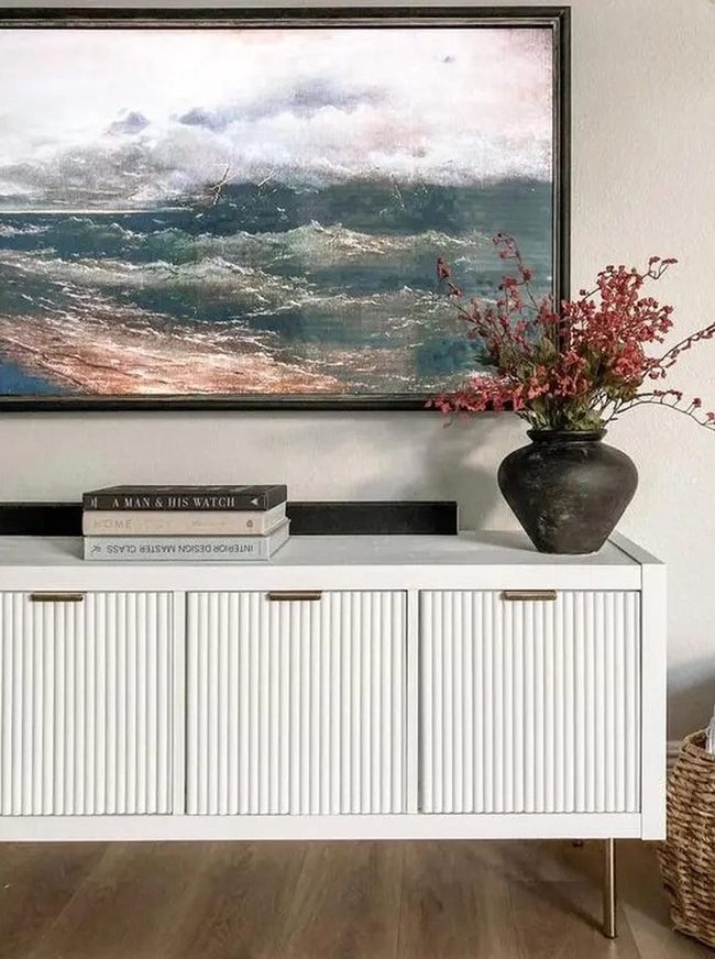 White Grooved Cabinet With Stormy Seascape