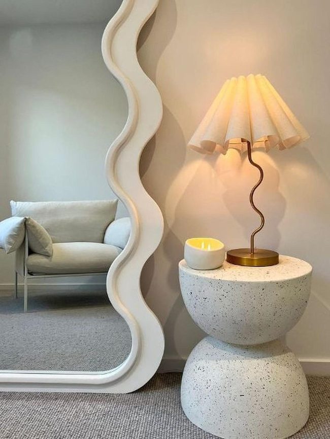 Wavy Mirror With Warm Gold Accents