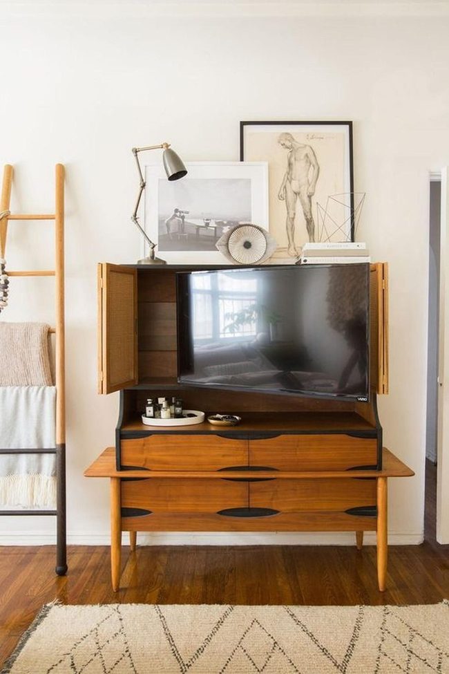 Wood Cabinets Hide Television Neatly