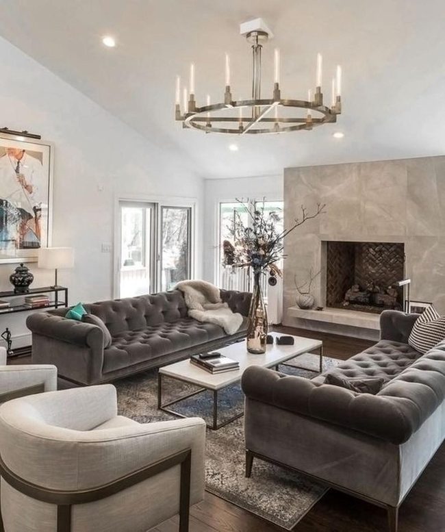 Stone Fireplace And Gray Seating