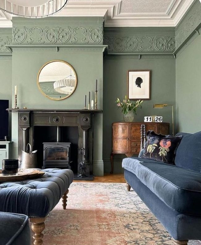 Green Walls, Dark Fireplace, Blue Velvet