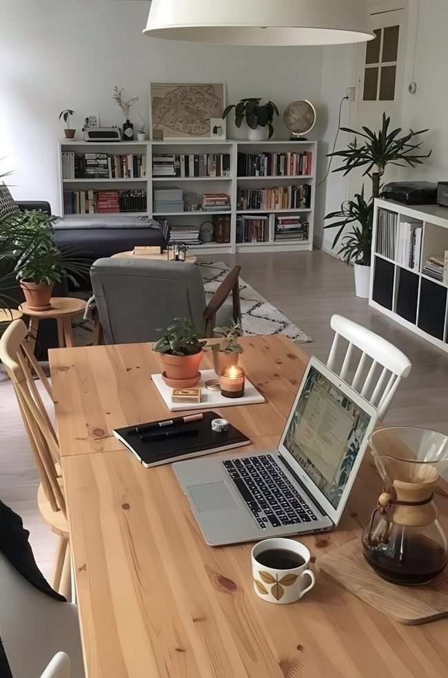 Green Plants And Wooden Workspace