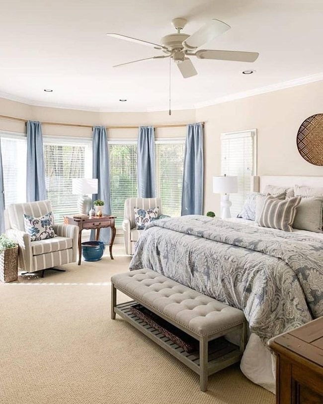 Blue Curtains Frame Serene Bedroom Retreat