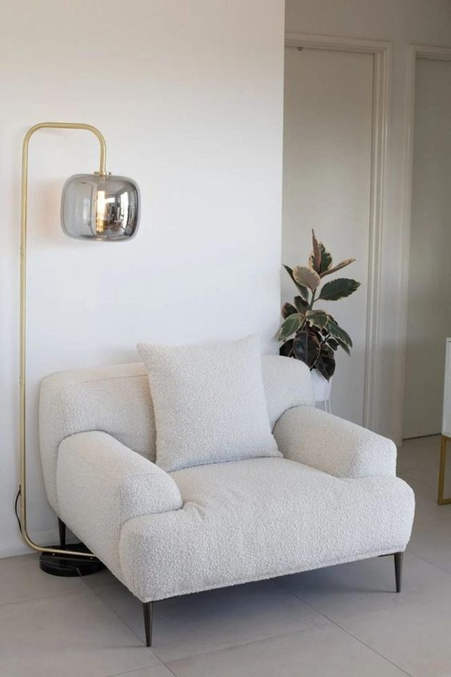 Plush White Chair In Serene Minimalism