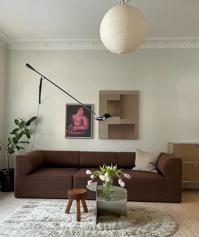 Brown Curved Sofa With Soft Layered Comfort