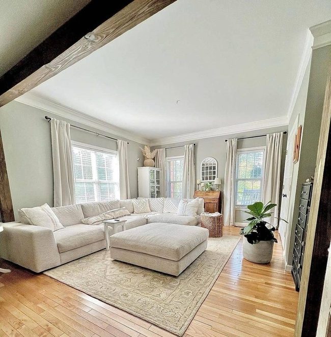 White Sectional With Natural Rattan Warmth