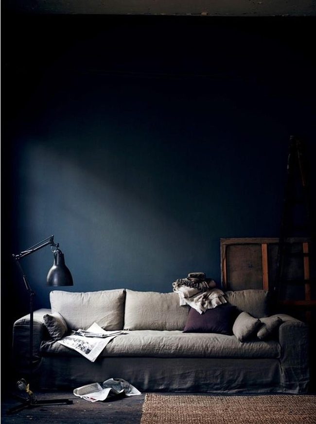 Dark Blue Walls And Lived-In Comfort