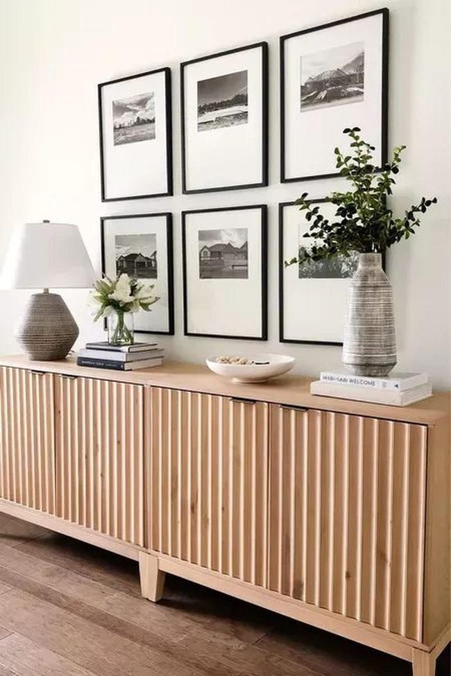 Black And White Gallery Above Striped Wood