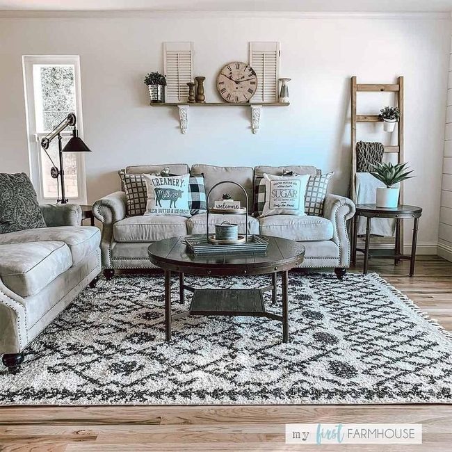 Gray Rolled Arm Sofas With Geometric Rug