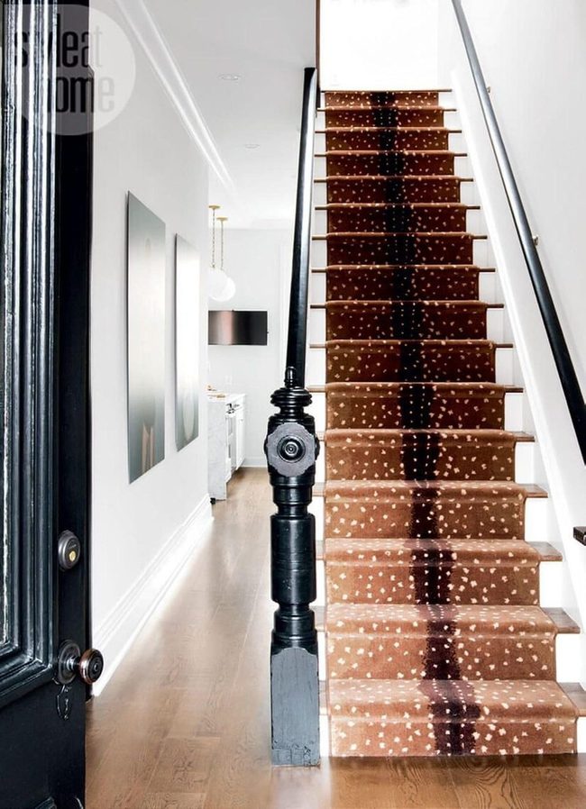 Black Handrails Frame Bright Hallway