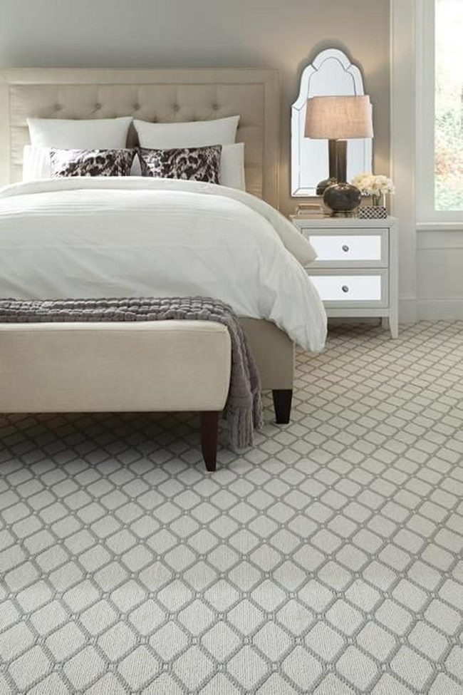 Beige Bed With Dark Patterned Pillows