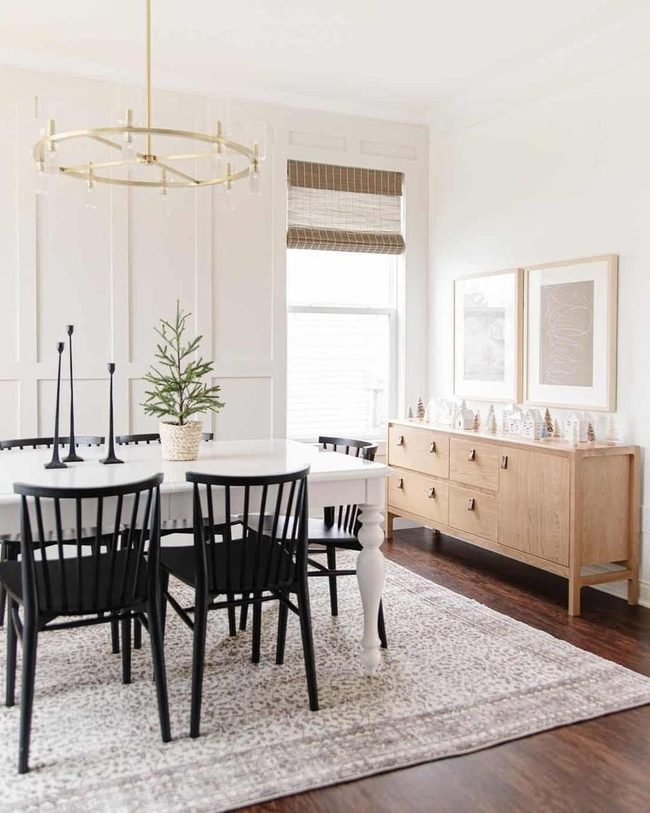 White Paneling With Gold Chandelier Statement