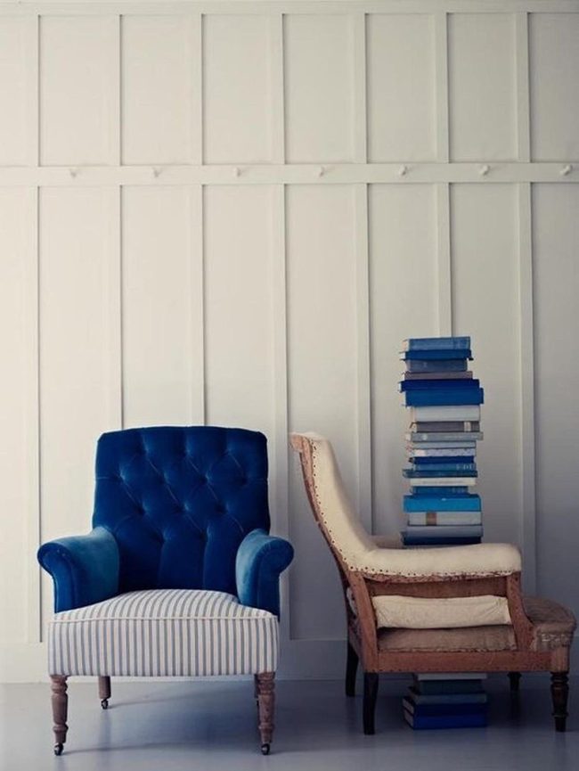 Blue Chairs And Stacked Books