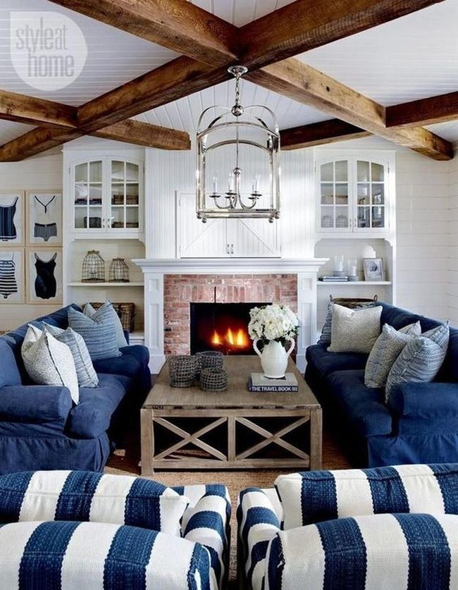 Wooden Beams, Navy Sofas, White Walls