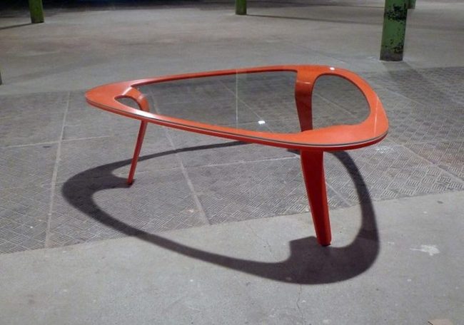 Orange Glass Tables With Green Pillars