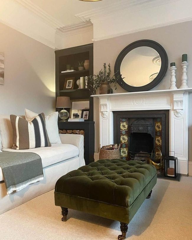 Emerald Ottoman Anchors Modern Fireplace Room
