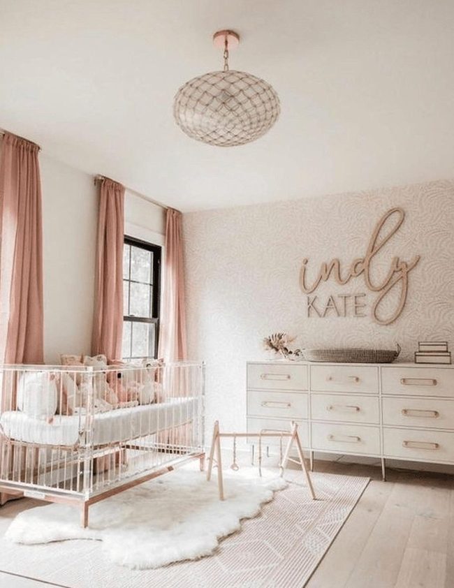 Pink Light Nursery With Wood