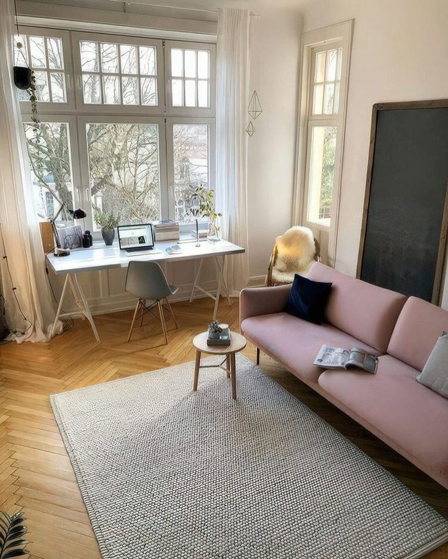 Pink Sofa Meets Sunlit Workspace