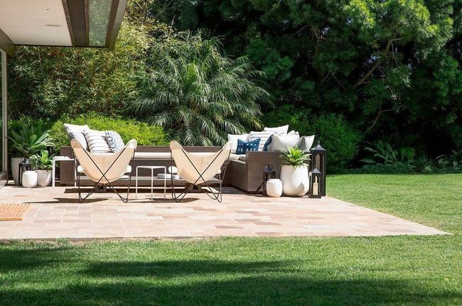 Sectional Seating Around Crackling Flames