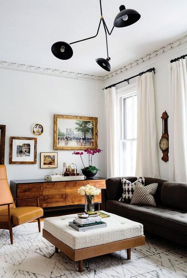 Sunlit Room With Dark Wood And Family Gallery