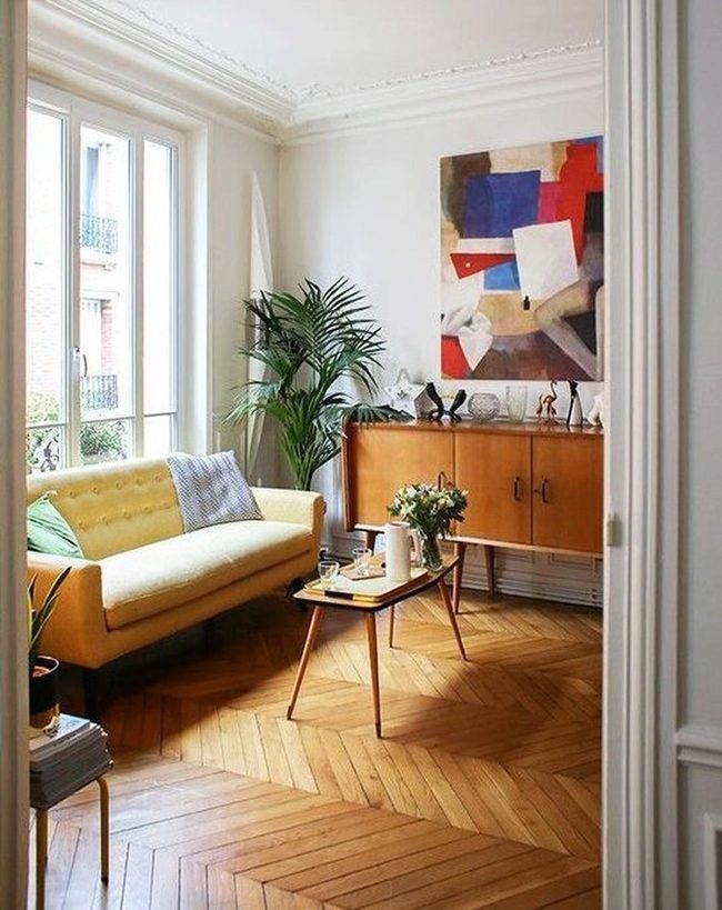 Golden Light Through Herringbone Floors