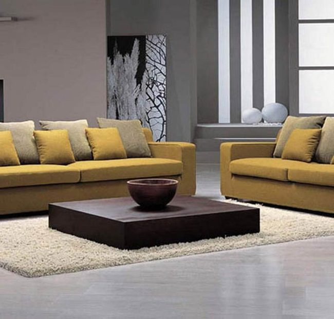 Bright Yellow Sofas Meet Gray Walls