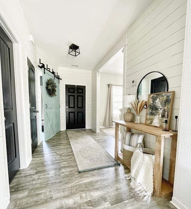 Natural Wood Hallway Meets Black Steel