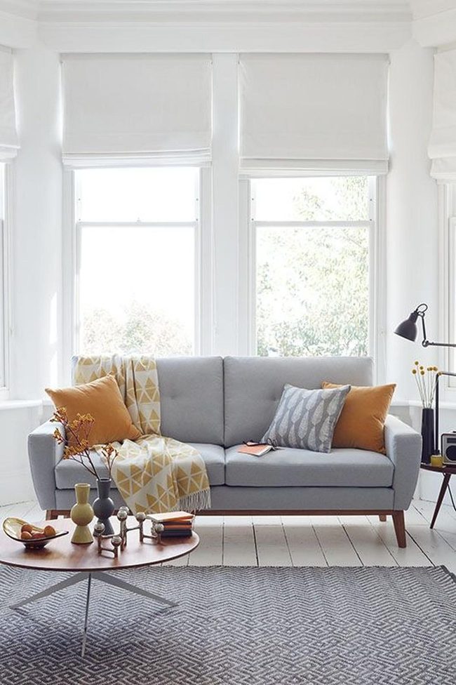 Orange Accents Transform Grey Sofas
