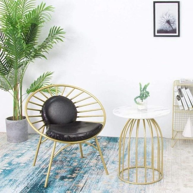 Gold-Framed Corner With Blue Patterned Rug